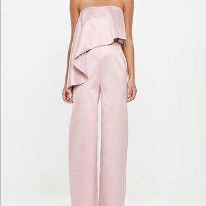 pink jumpsuit with satin fabric and bandeau style